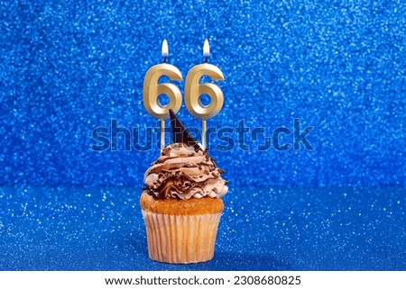 Cupcake With Number For Celebration Of Birthday Or Anniversary; Number 66 Royalty-Free Stock Photo #2308680825