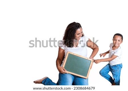 mother and son holding blackboard isolated on white background