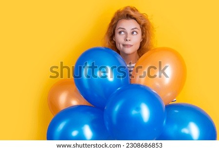 happy birthday woman hold balloons in studio. dreamy woman with balloon for birthday party