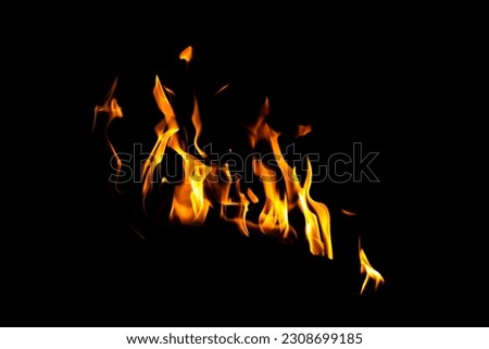 Fire flame texture. Burning material backdrop. Burn effect pattern. Blaze and torch wallpaper. Heat and haze backdrop. Exploison and hot background.