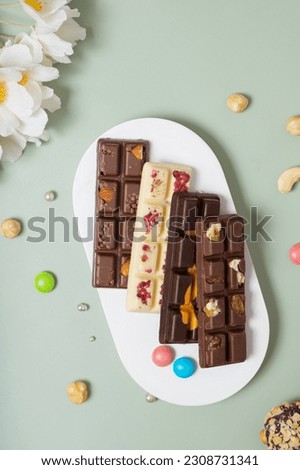 Healthy craft natural mini chocolates top view. Sweet food, healthy dessert flat lay.