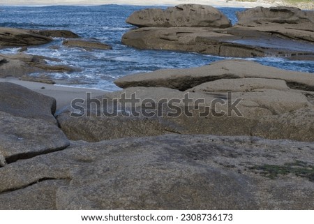 Sea beach sun rocks and waves