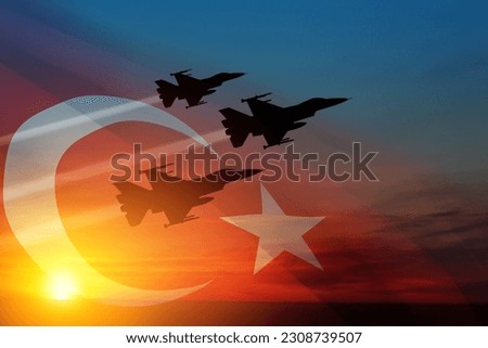 Aircraft silhouettes on background of sunset with a transparent Turkey flag. Turkish Air Force aerobatic demonstration. Air Force Day. Turkish Air Force Foundation Day. Royalty-Free Stock Photo #2308739507