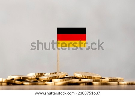 The Flag of Germany with Coins. Royalty-Free Stock Photo #2308751637