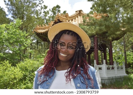 Exceptionally beautiful plus size model in a Japanese Garden