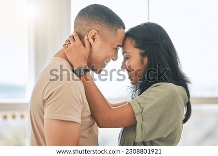 Couple, love and forehead touch in home for happiness, intimacy and relax for romance, bonding and trust together. Happy man, woman and hug partner for quality time, care and smile for commitment Royalty-Free Stock Photo #2308801921