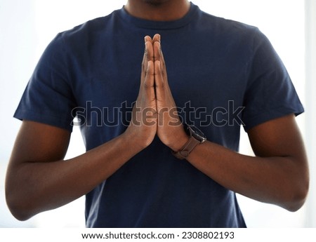 Hands, worship and man praying in studio in hope of help, guidance and gratitude in white background. Hand, pray and male person in prayer to Jesus Christ, humble and spiritual, holy and Christianity Royalty-Free Stock Photo #2308802193