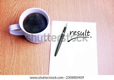 Business Concept - Steamy Coffee And Black Pen With White Paper Writing Result On The Table 