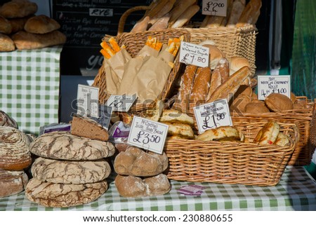 Freshly baked loaves of bread on a market stall