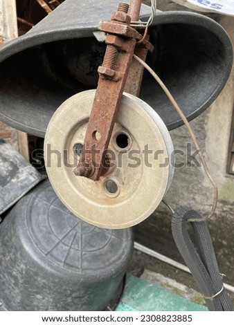 Solo-Indonesia, May 27, 2023 Photo of a lead well pulley.