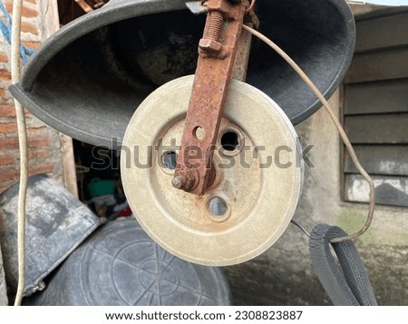 Solo-Indonesia, May 27, 2023 Photo of a lead well pulley.