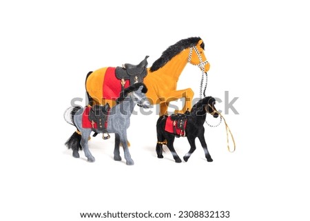 Plastic horse toy isolated on white. High quality photo