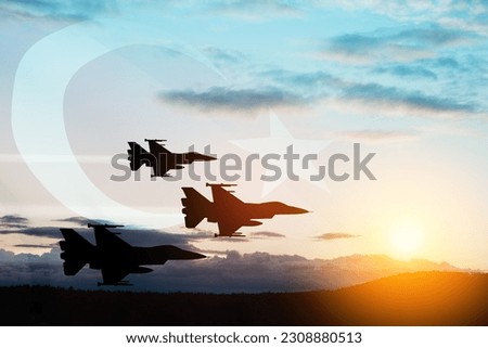 Aircraft silhouettes on background of sunset with a transparent Turkey flag. Turkish Air Force aerobatic demonstration. Air Force Day. Turkish Air Force Foundation Day. Royalty-Free Stock Photo #2308880513