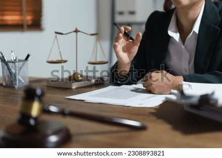 Businesswoman lawyer talks and explaining agreement business of contract to client in legal office. Royalty-Free Stock Photo #2308893821