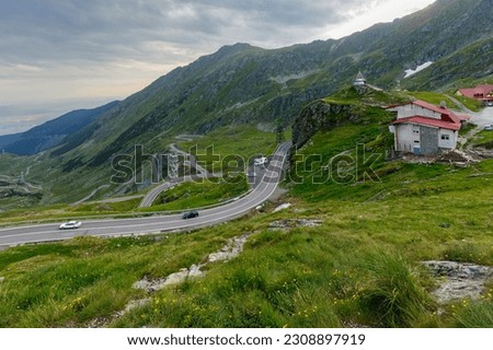 The carpathian mountains with the winding transfaragasan road Royalty-Free Stock Photo #2308897919