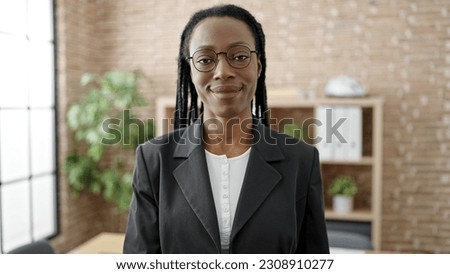 African american woman business worker smiling confident standing at office