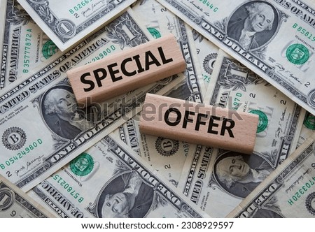 Special offer symbol. Concept word Special offer on wooden blocks. Beautiful dollar background. Business and Special offer concept. Copy space