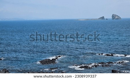 It is a beautiful place and a great picture of Jeju Island. Brothers Island in Jeju Island is a deserted island overlooking Sanbangsan Mountain. Large and small islands face each other like brothers.