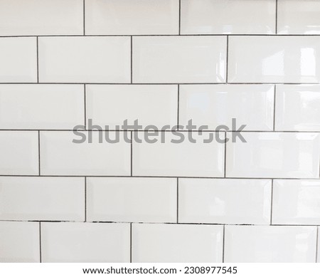 White tile wall in the kitchen