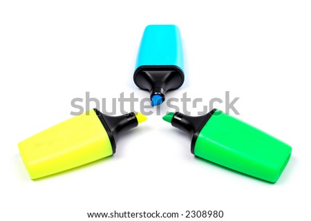 Assortment of three coloured labelers with shadow on white background