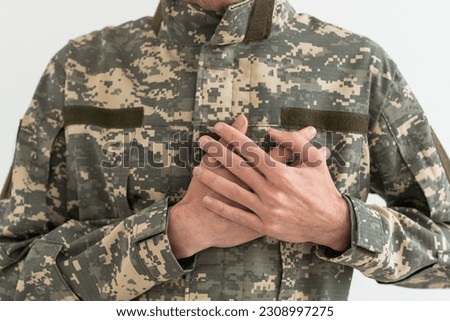 a military man is heartbroken. Royalty-Free Stock Photo #2308997275