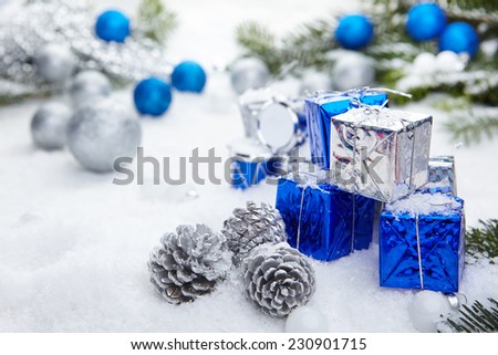 Blue chrismas  gifts box on snow