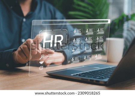 Human resources technology modern technologies for simplifying human resources system concept, Businessman management  Human resources, and check data person management in the organization effectively Royalty-Free Stock Photo #2309018265