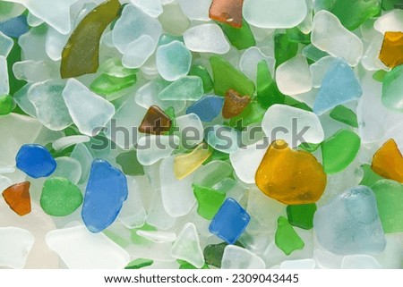 Sea Glass Mosaic, patterns made from Ocean glass, its a lifestyle background made with natural colours of blue, green, brown and white, hand made feeling like handcraft. Beach Glass, Sea Glass. brocen Royalty-Free Stock Photo #2309043445