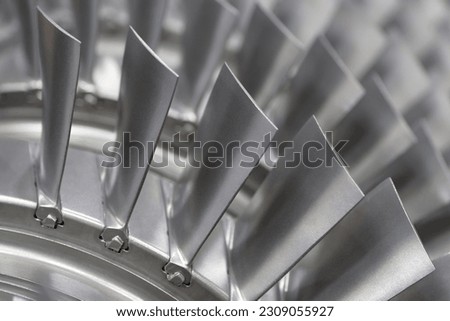 Horizontal close-up shot of turbine blades set, aircraft or energetics industrial abstract background Royalty-Free Stock Photo #2309055927