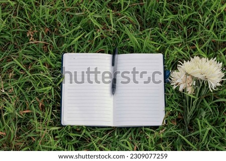 open diary book with a bunch of beautiful flowers. for design, for background, for wallpaper.