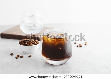 Iced Coffee, Cold Brew Coffee with Ice on Bright Light Grey Background, Refreshing Beverage Royalty-Free Stock Photo #2309099271
