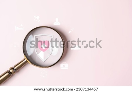 Health insurance concept. people hand holding magnifier focus to plus sign and protection icon. healthcare medical icon, health and access to welfare health.