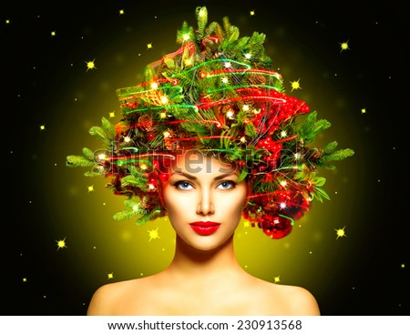Christmas Winter Fashion Model Girl with Christmas tree hairstyle decorated with garland lights and baubles. make up. Beauty Woman. Beautiful New Year Holiday Creative Hair style