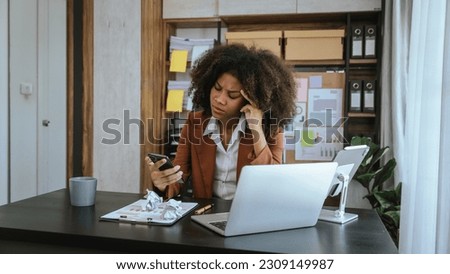 Tired african american business woman working with audit, balance sheet, investing activities, safety stock, net loss, business risks, accumulated depreciation, factory overhead, accrued expense