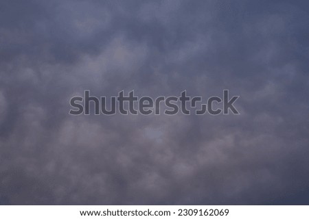 Pink and blue storm cloud sky