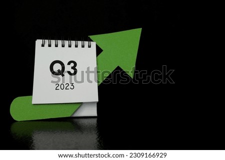 Third quarter of 2023 positive growth performance financial report and fiscal concept. Upward arrow with increasing coins and calendar in black background. Royalty-Free Stock Photo #2309166929