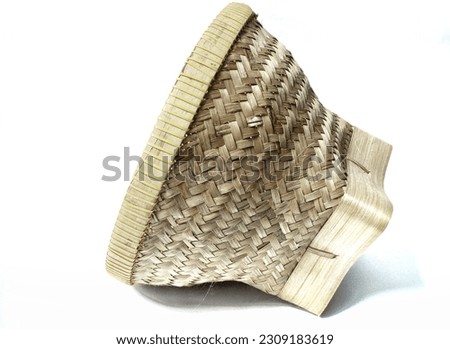 you can see a rice basket with a white background for cooking which is commonly used in Indonesia