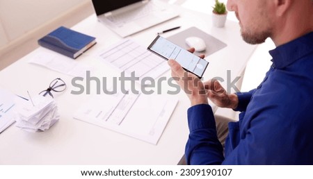 Taking Invoice Document Photo Using Phone Or Smartphone