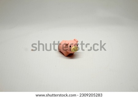 Pig doll made of small flexible rubber