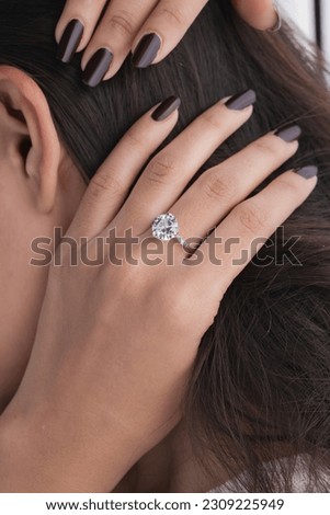 Diamond ring with model hand ,Silver golden plated jewelry ring for girls  Royalty-Free Stock Photo #2309225949