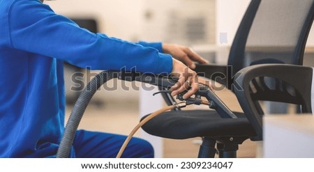 Machine cleaning of office chairs Royalty-Free Stock Photo #2309234047
