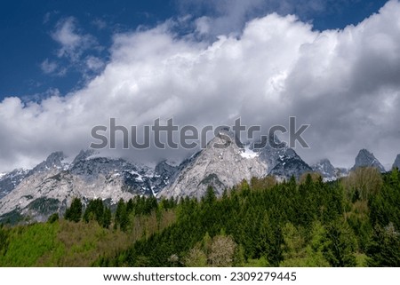 Cloudy mountain pick in Austrian alps, scenery picture of Alps