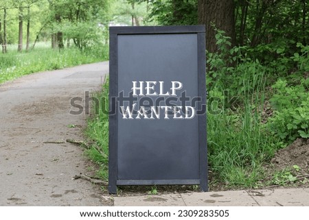 Help wanted signs on the farm. Labor shortage in agriculture, labor market and employment concept in agriculture.