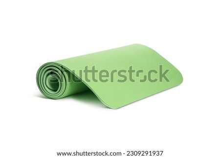 Yoga mat for fitness exercise isolated on white background. With clipping path Royalty-Free Stock Photo #2309291937
