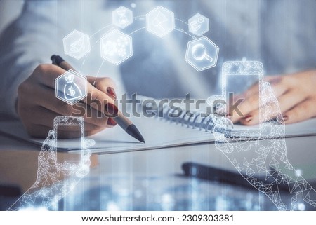 Technology theme hologram over woman's hands taking notes background. Concept of Tech. Double exposure
