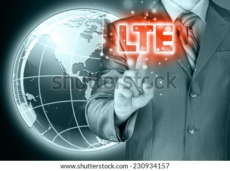 businessman is pushing his finger on lte button