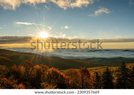 Sunburst Over Cloud Filled Valley off the Blue ridge parkway in fall