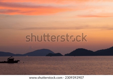 landscape picture of the ocean in twilight.