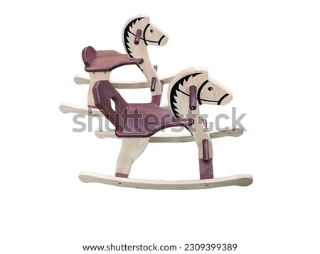 two rocking wooden horses isolated
