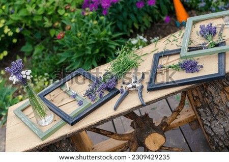 lavander flowers bouquet in wooden frame, creative ideas